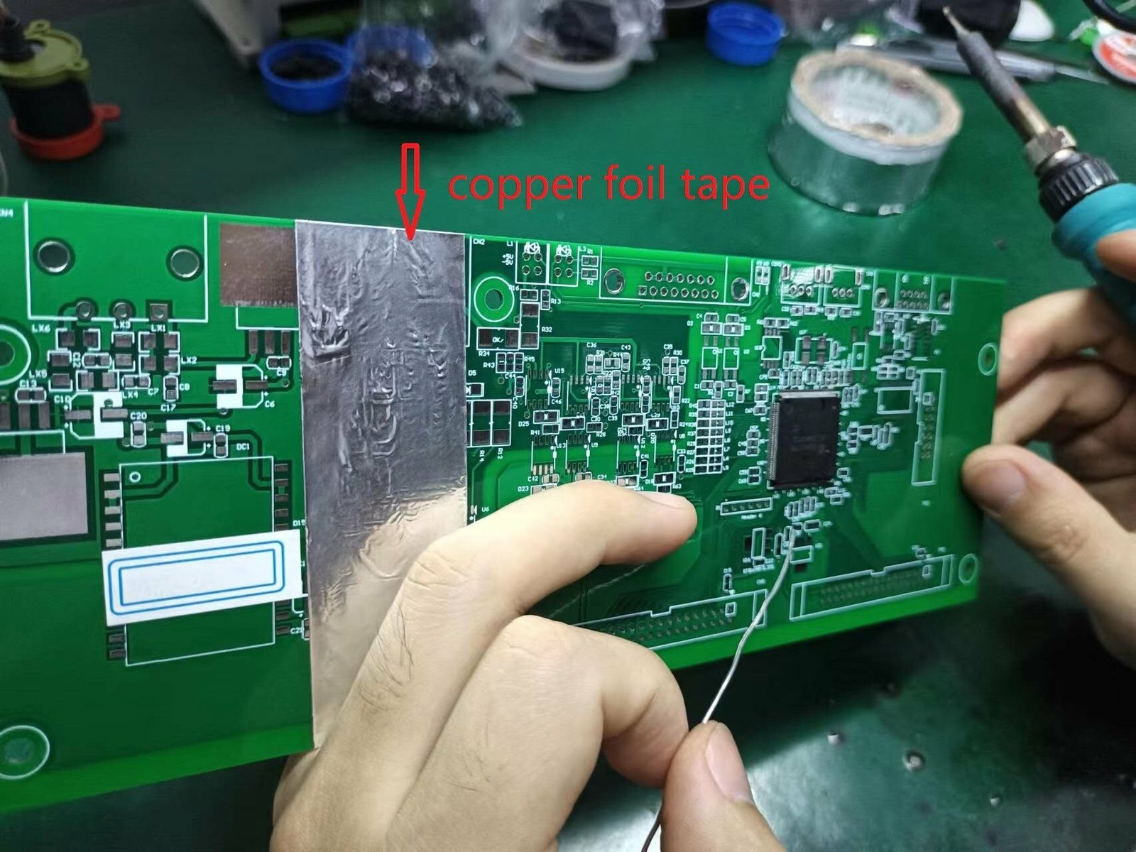 PCB Repair-Apply copper foil tape to the copper wire