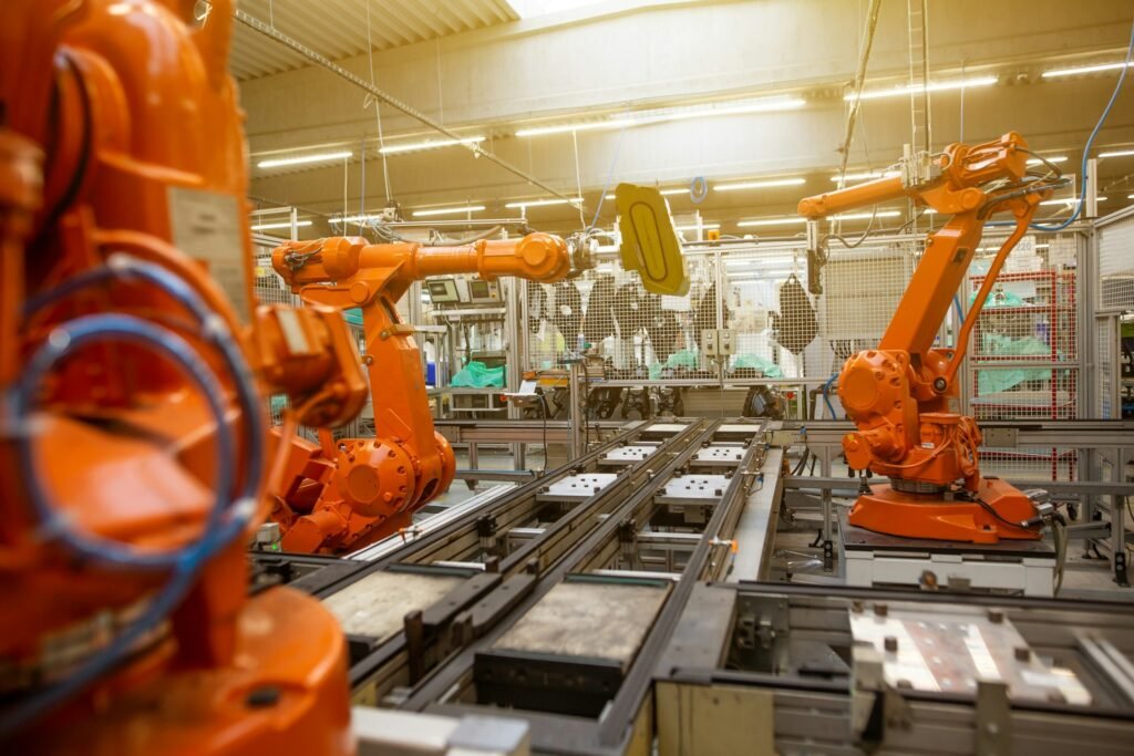 Electronic Manufacturing Services: A Comprehensive Guide 4 Futuristic electronic manufacturing facility with advanced technology and automation