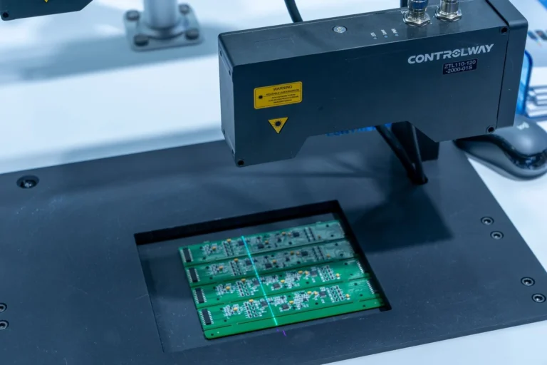 Automated optical inspection system scanning a populated PCB panel during electronics manufacturing review